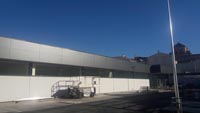 Cubierta y fachada en supermercado Aldi en Antequera (Málaga). <br>Impermeabilización de cubierta y revestimiento de fachada. Fachada panel fenólico 